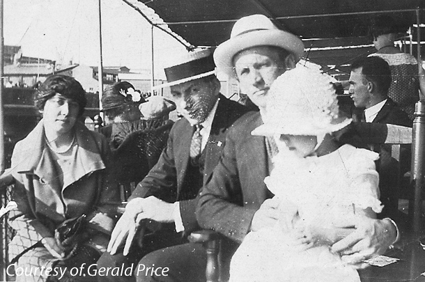 Roy E. Price [straw hat