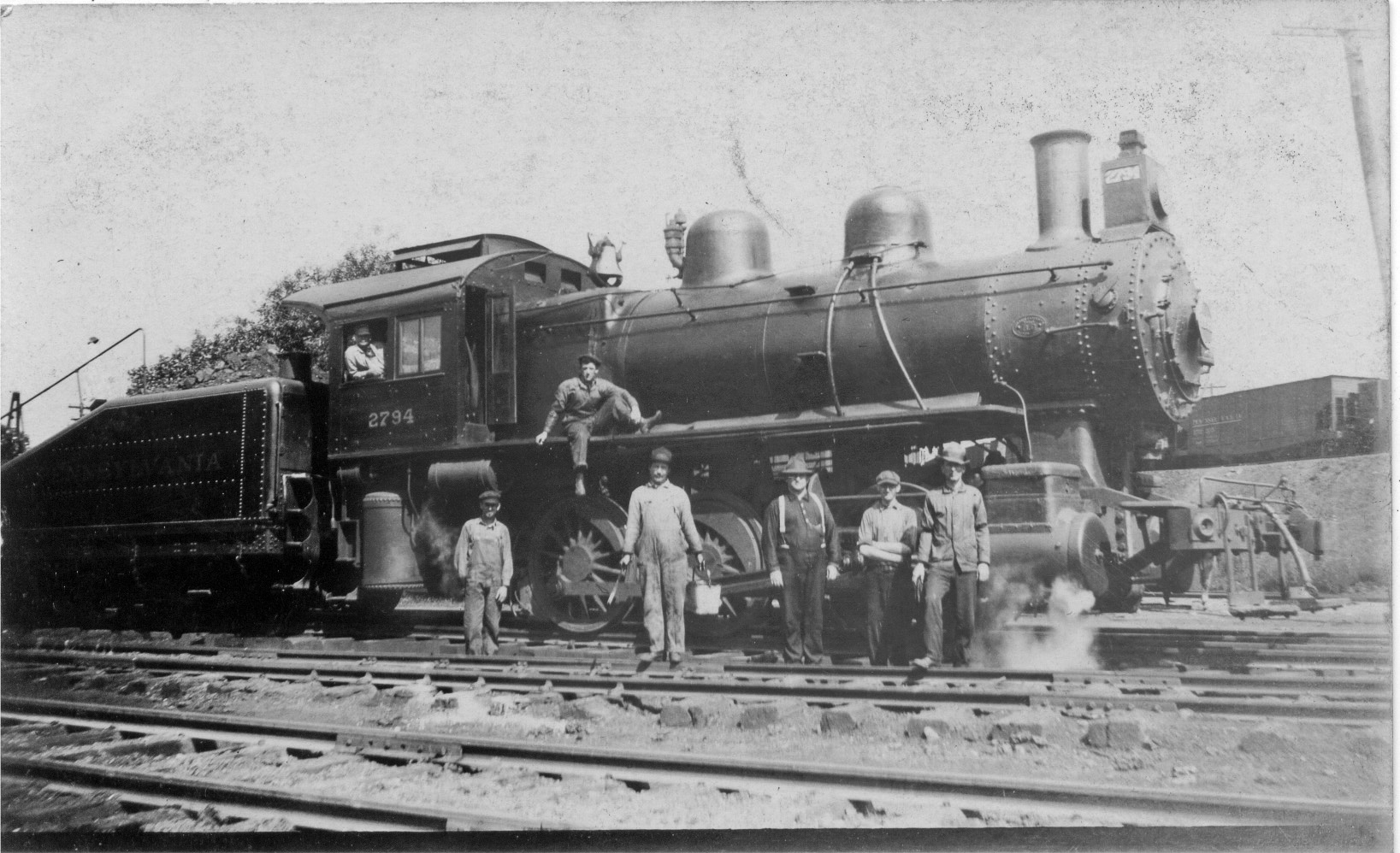 Unknown Train Crew (probably includes George Frank McManus - possibly the Engineer) [postcard photo]