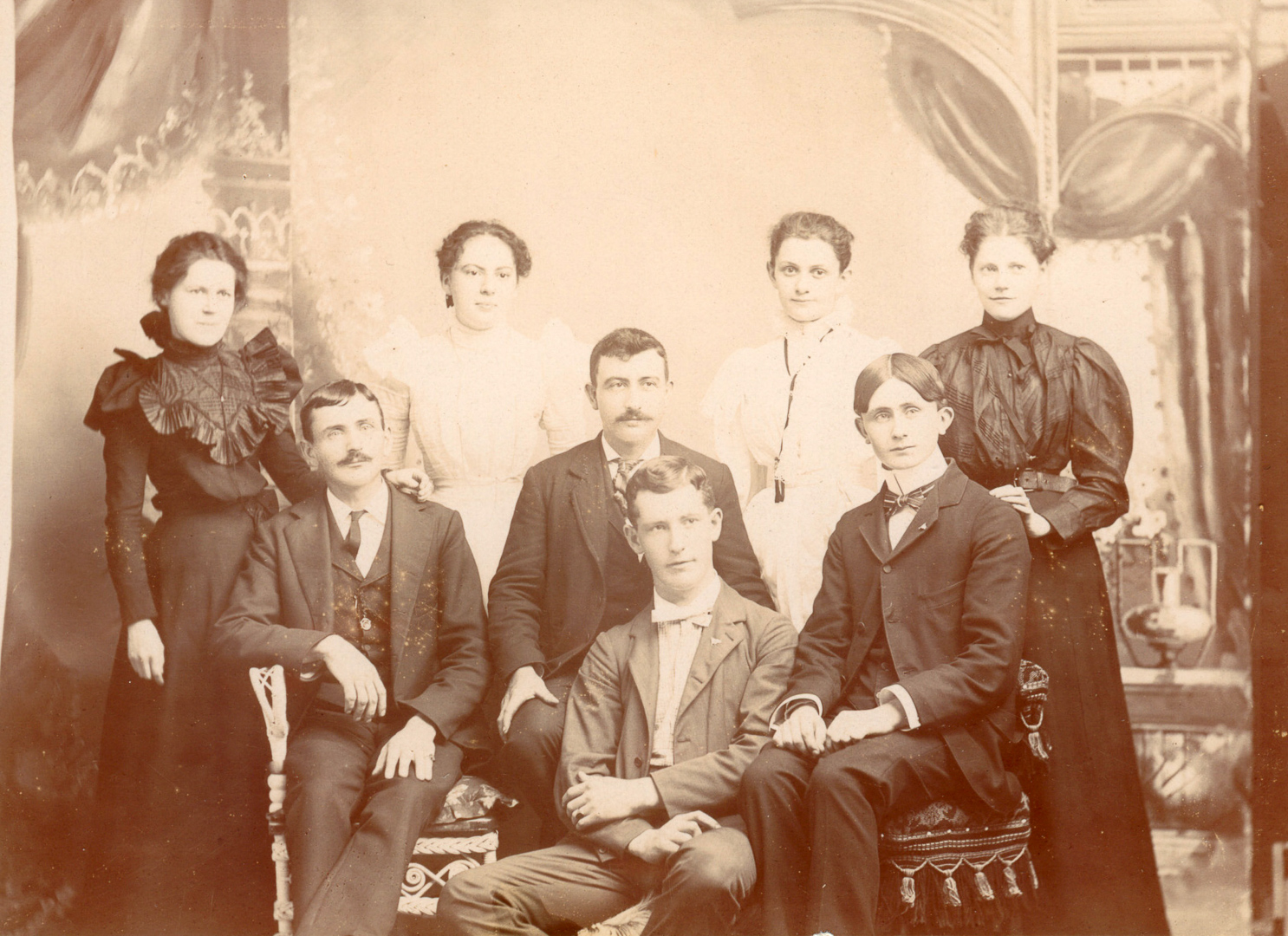 [Children of John & Angeline McManus: Mary E. & her daughter Anna, Agnes B. & Cecilia J,; Henry T., George F., & Eugnee J.; Daniel Coady (probable)] Studio: St. John, Erie PA